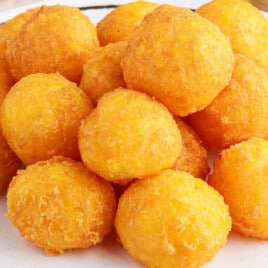 a bunch of Fried Cheese Balls on a plate