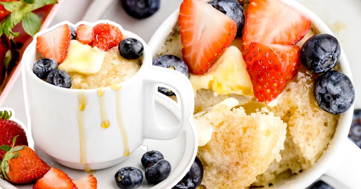 Pancake in a Mug with some strawberry and blueberry toppings