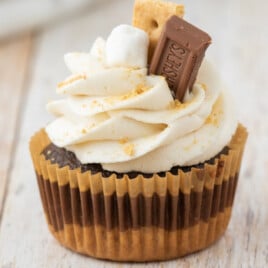 a S'mores Cupcake on a wooden surface