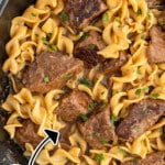 Beef noodles in a cast iron skillet