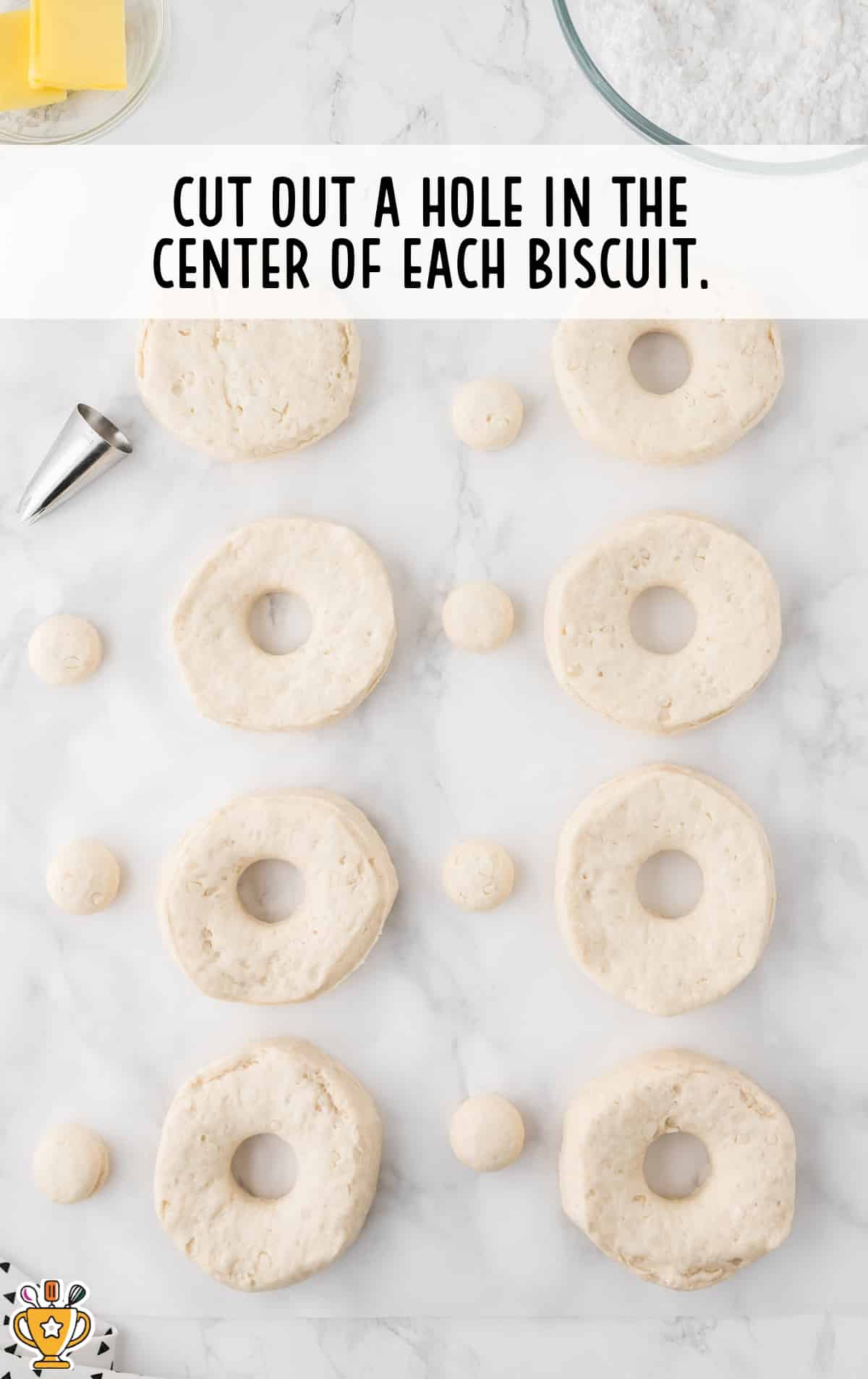 Air Fryer Donuts biscuits with cut holes at the center of each