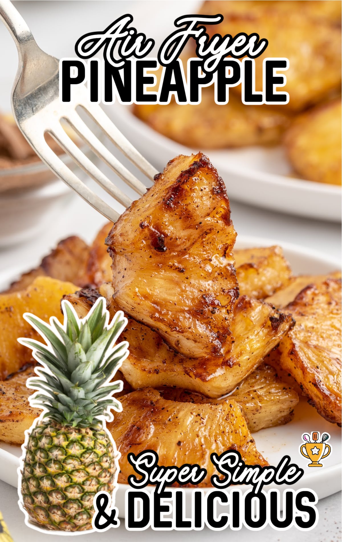 Air Fryer Pineapple on a plate with a fork