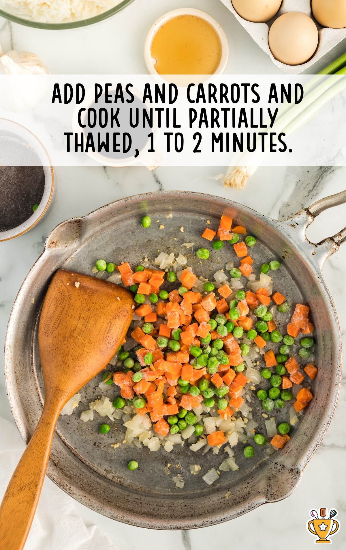 peas and carrots in a pan