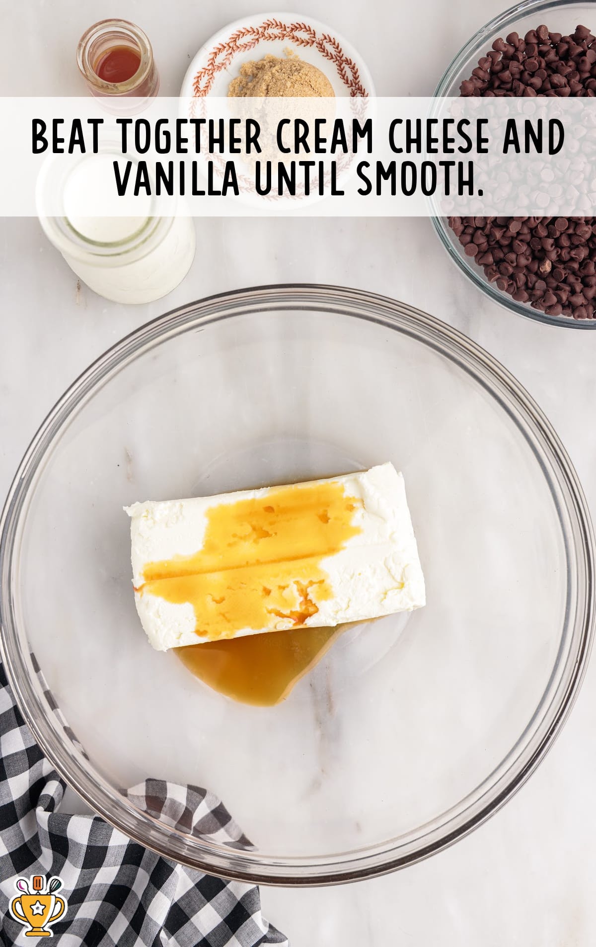 cream cheese and vanilla in a bowl