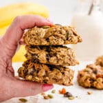 a hand holding three Breakfast Cookies