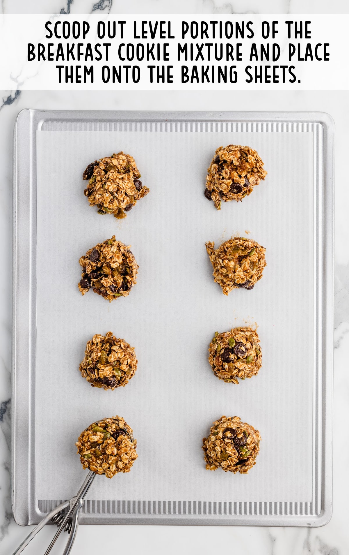 Breakfast Cookies mixture scooped out and placed on baking sheet
