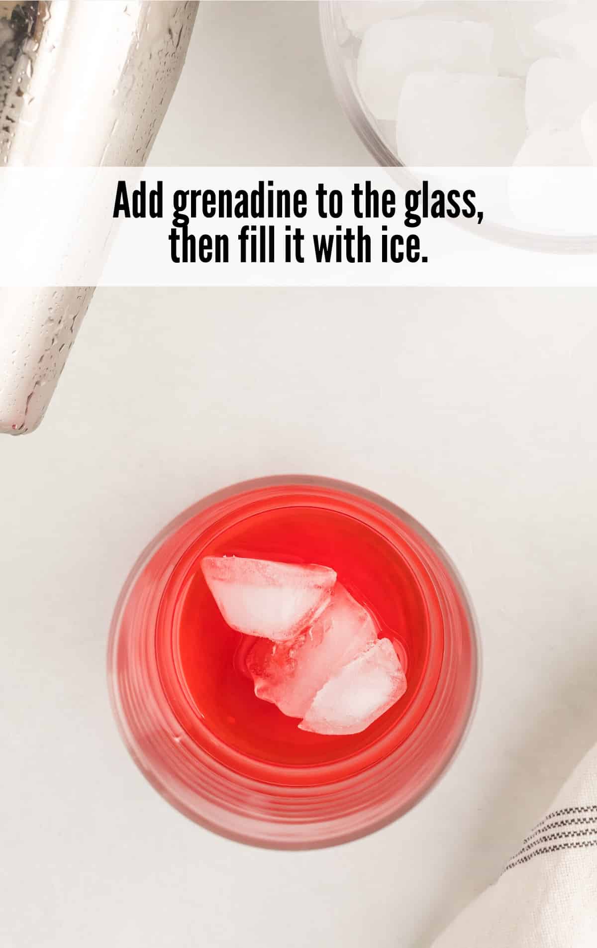 grenadine added to the glass with some ice
