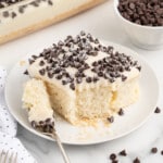 Cannoli Poke Cake on a plate