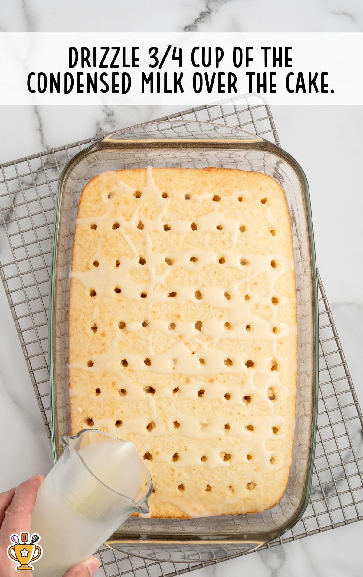 drizzling ¾ cup of the condensed milk over the cake