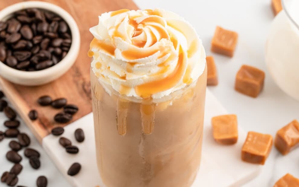 a glass full of Caramel Iced Coffee