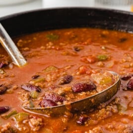 Chili in a pan with serving spoon in it