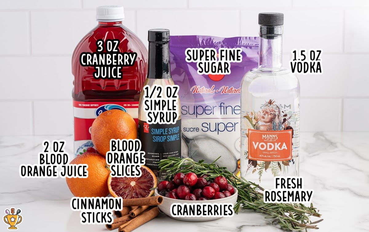 Ingredients for a cranberry Christmas cocktail including cranberry juice, blood orange juice, vodka, simple syrup, fresh cranberries, cinnamon sticks, and rosemary on a white countertop.