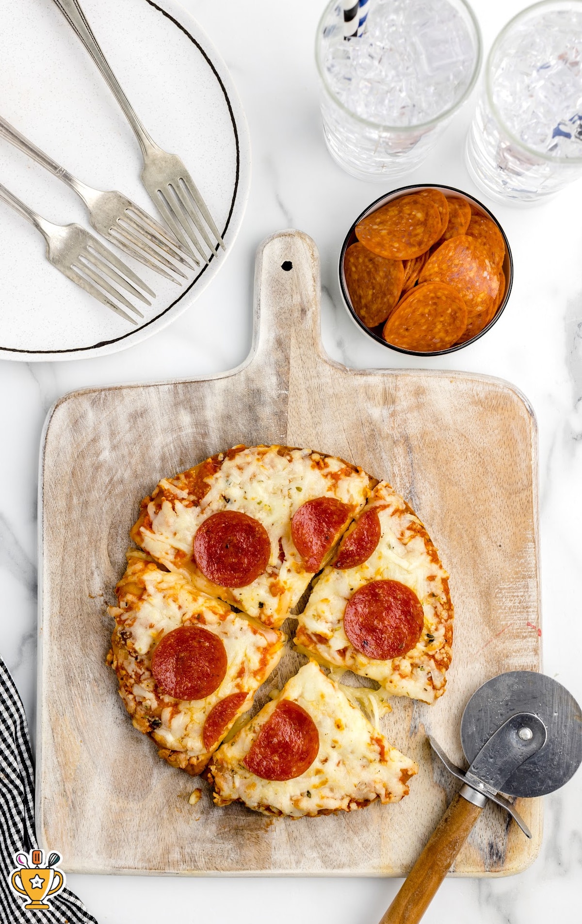 Frozen Pizza in Air Fryer on a wooden board
