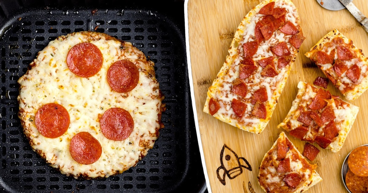 Frozen Pizza in Air Fryer in air fryer and a few pieces on a cutting board