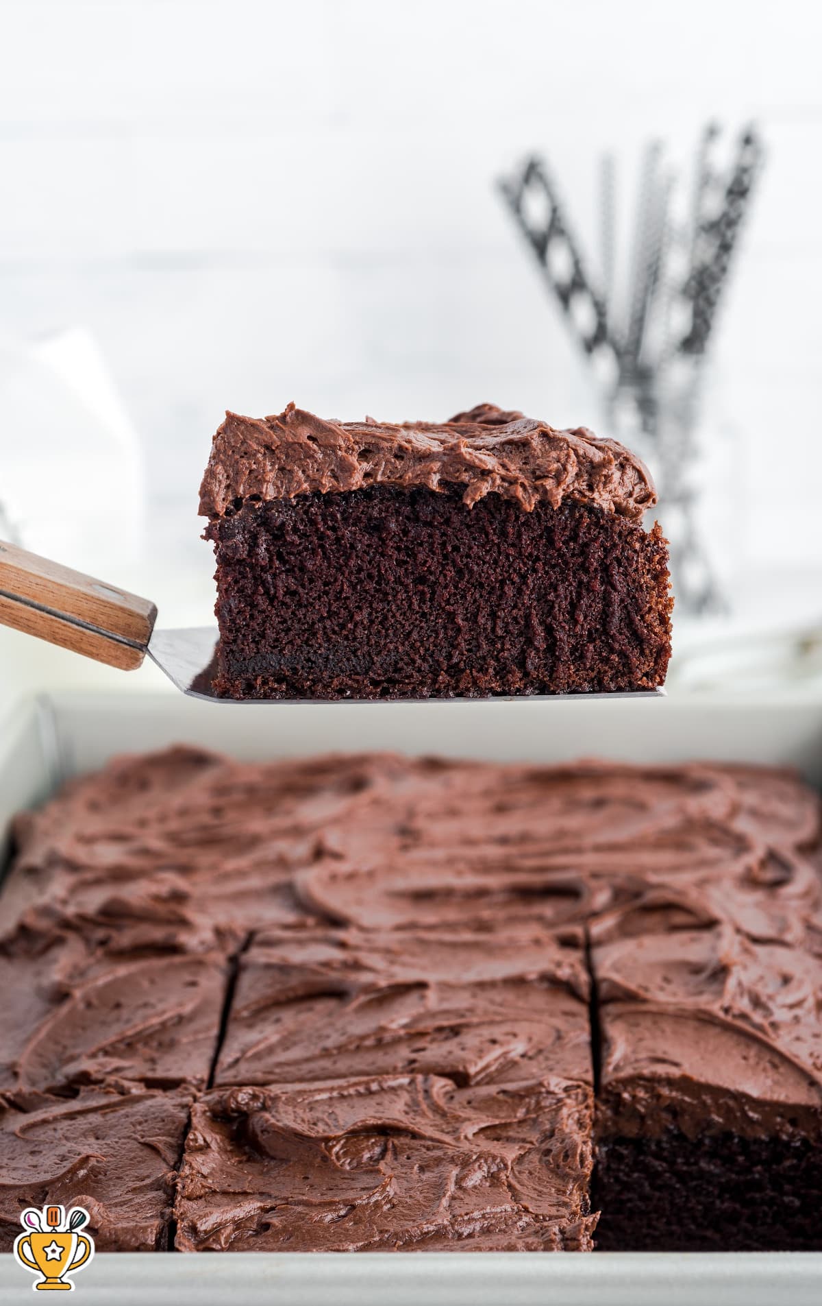 a spatula holding a piece of Hershey Chocolate Cake