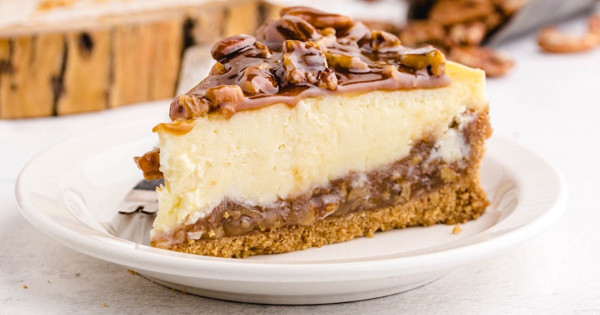 a slice of Pecan Pie Cheesecake on a plate