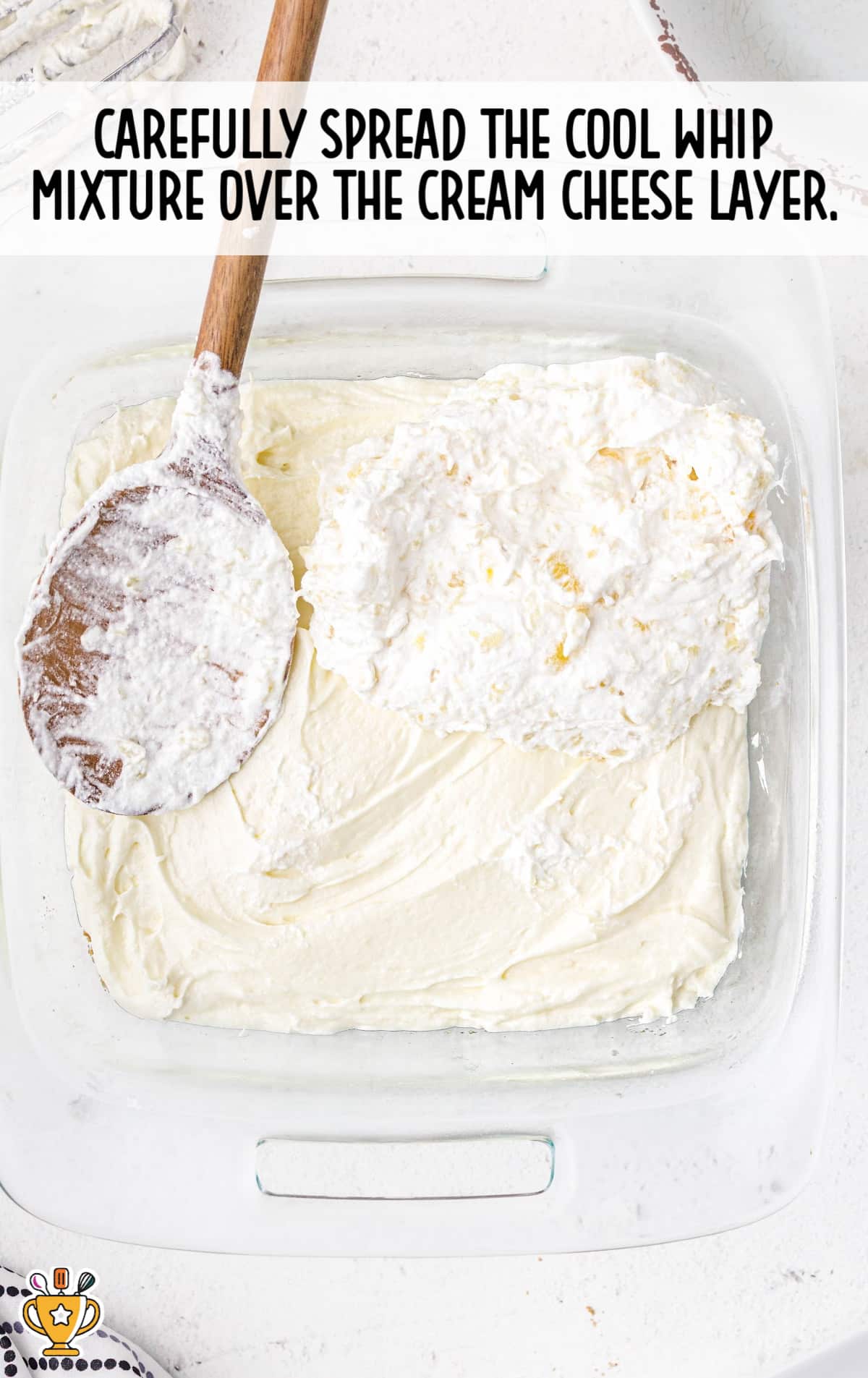 cool whip mixture spread over the cream cheese layer