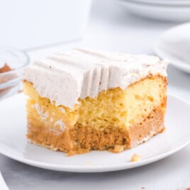 a piece of Pumpkin Magic Cake on a white plate