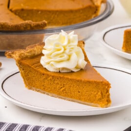a slice of Pumpkin Pie Recipe on a plate