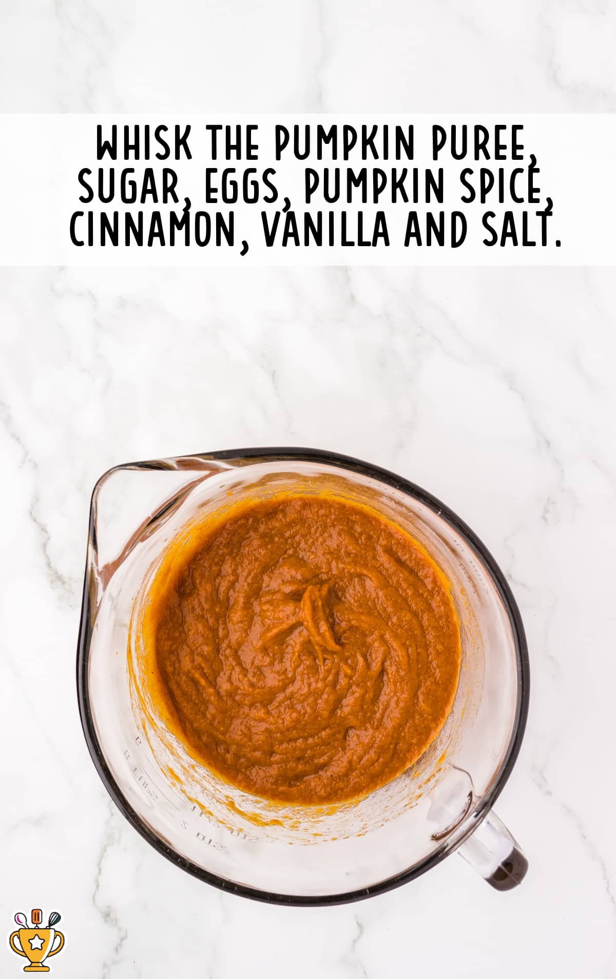 pumpkin puree, sugar, eggs, pumpkin spice, cinnamon, vanilla and salt whisked on a bowl