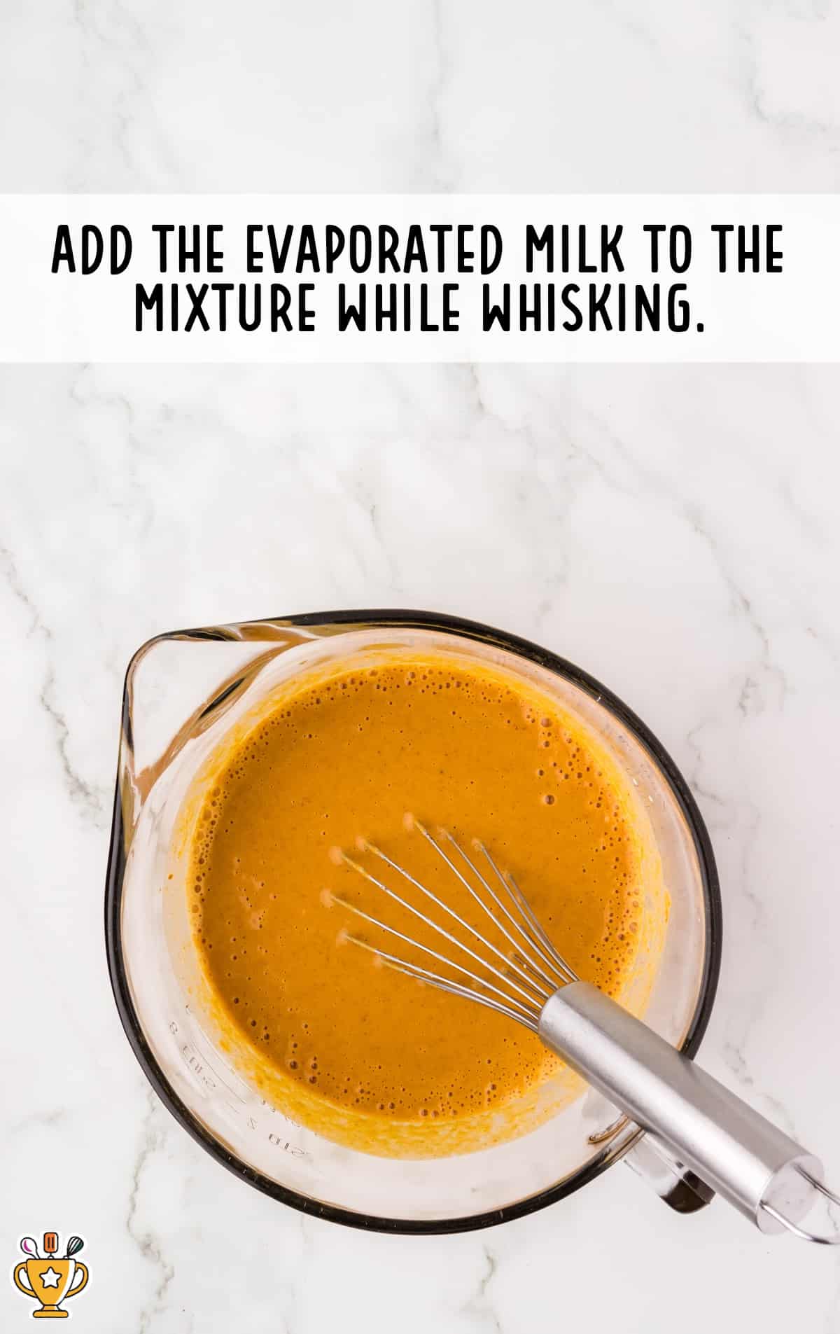 milk added to the mixture in a bowl