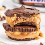 Two Snickers Cups stacked on top of one another