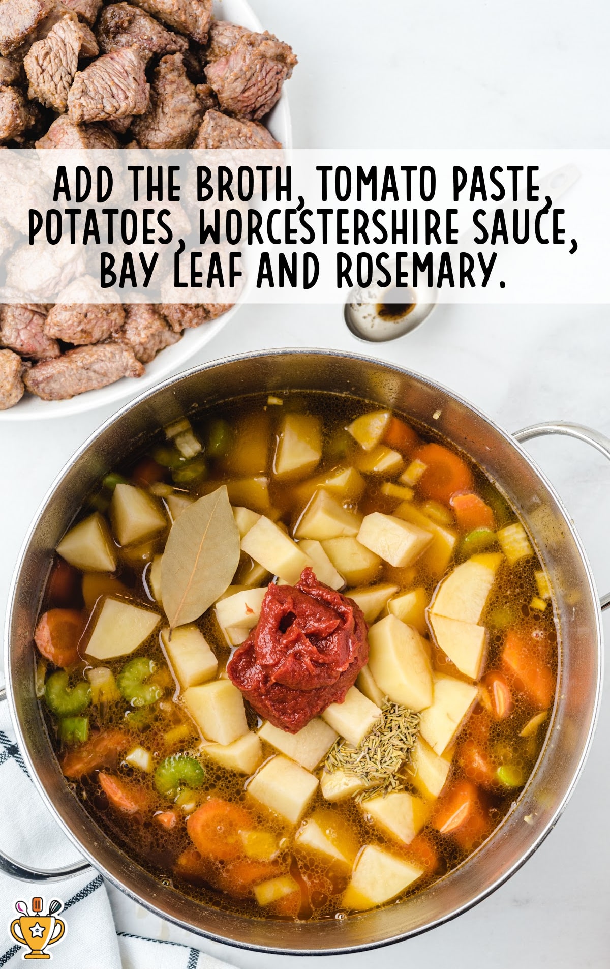 Beef Stew ingredients in a pan
