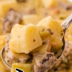 a spoon holding some Cheeseburger Soup