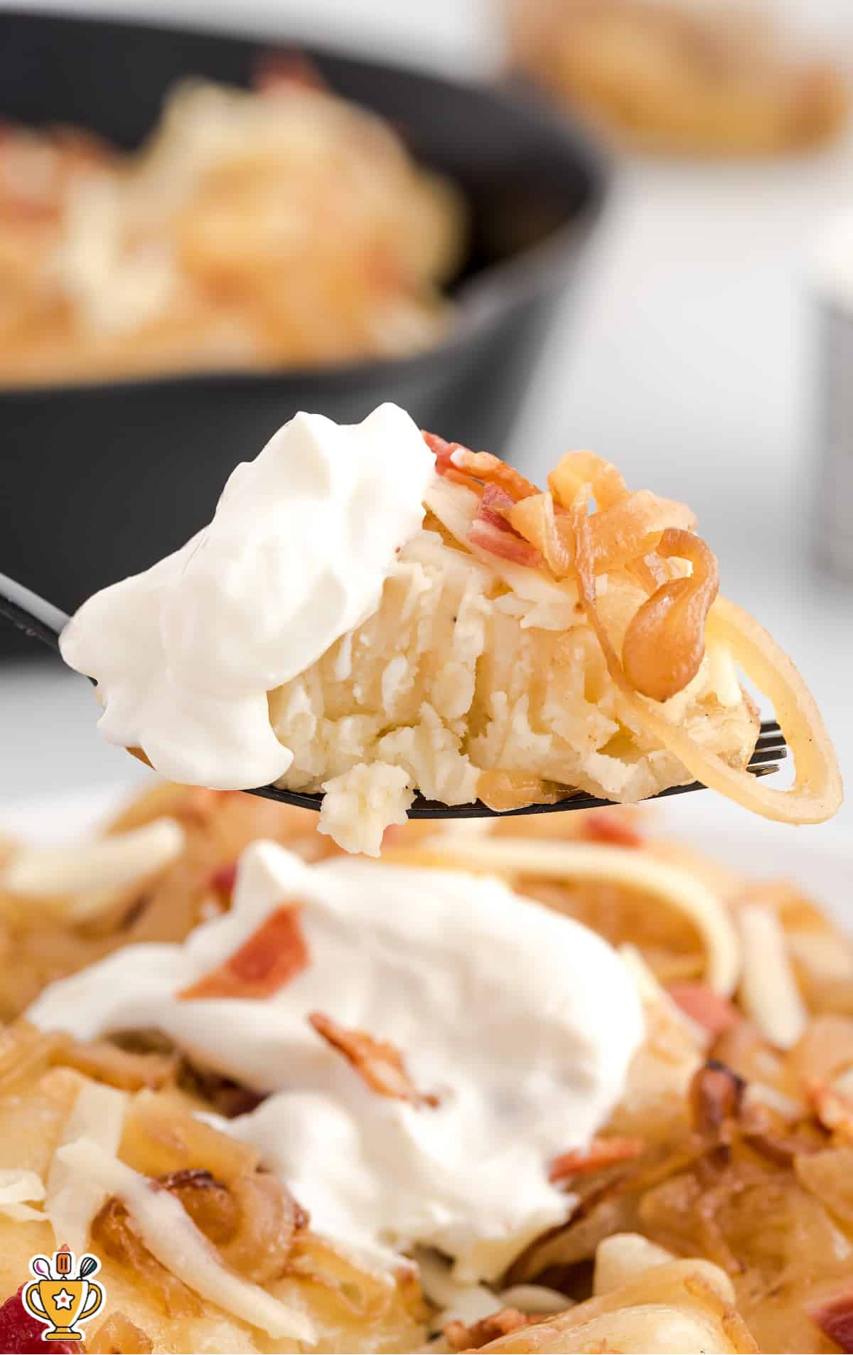 a fork holding some Fried Pierogies