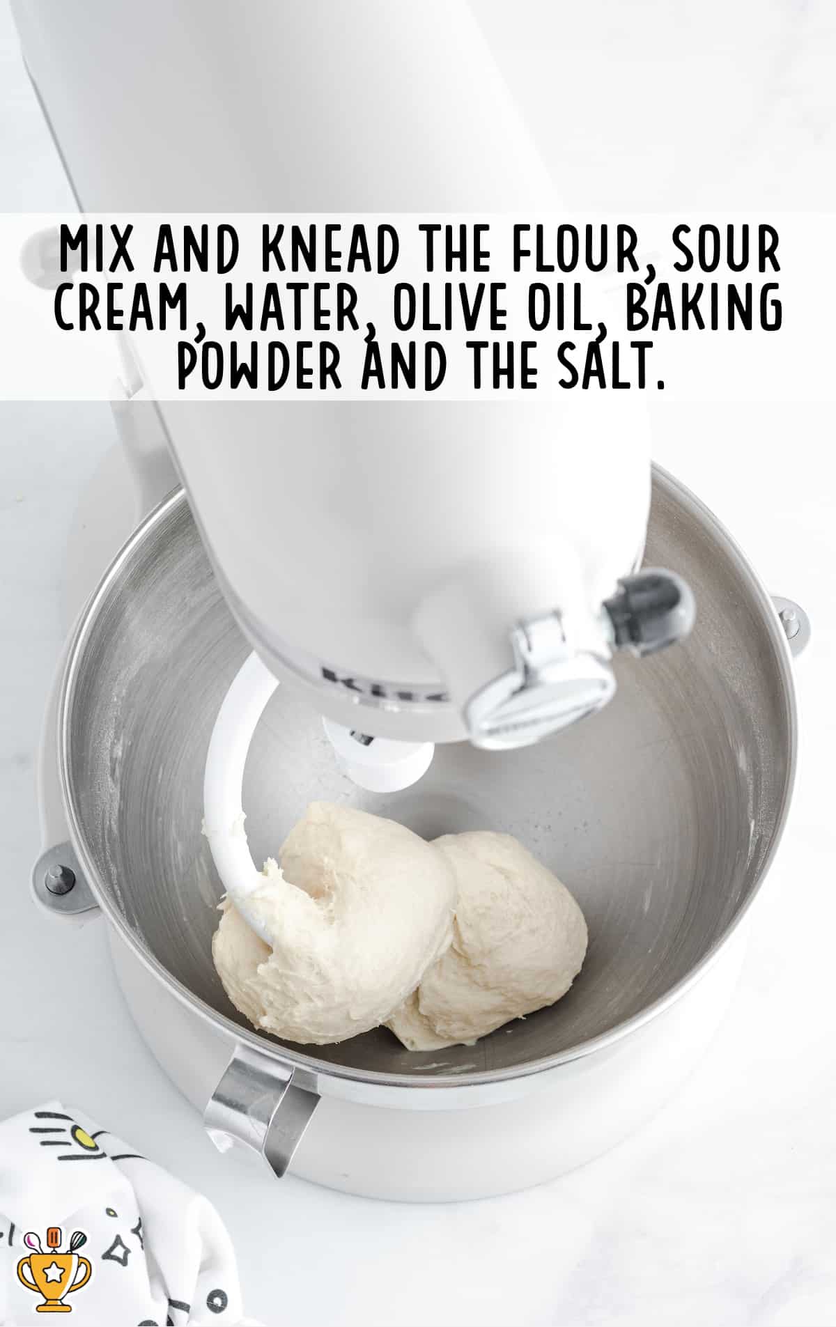 flour, sour cream, water, olive oil, baking powder and salt mixed in a pan