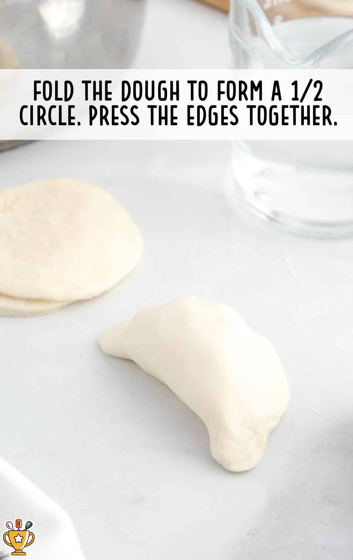 folded dough and edges pressed together