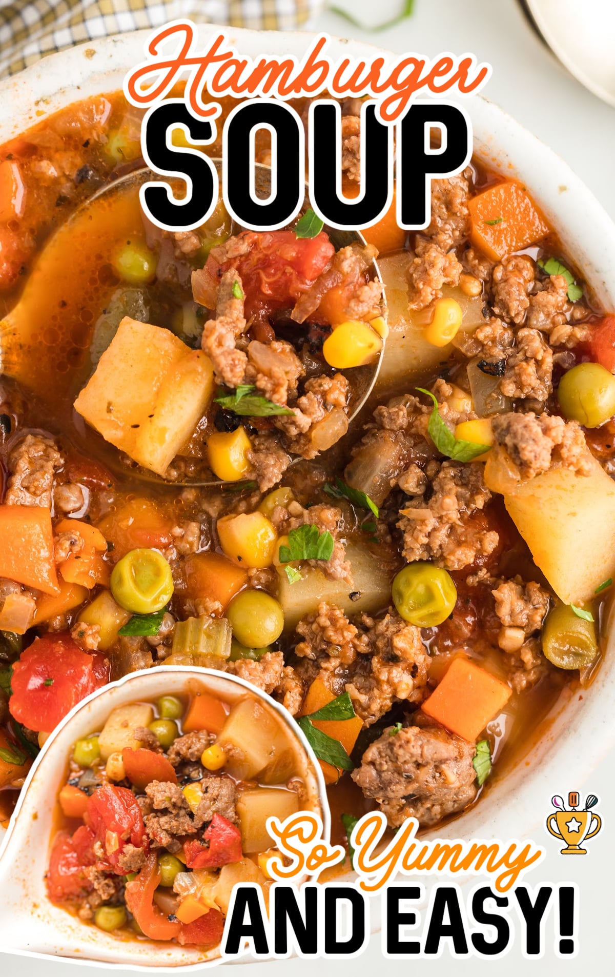 a bowl full of Hamburger Soup with a spoon in it