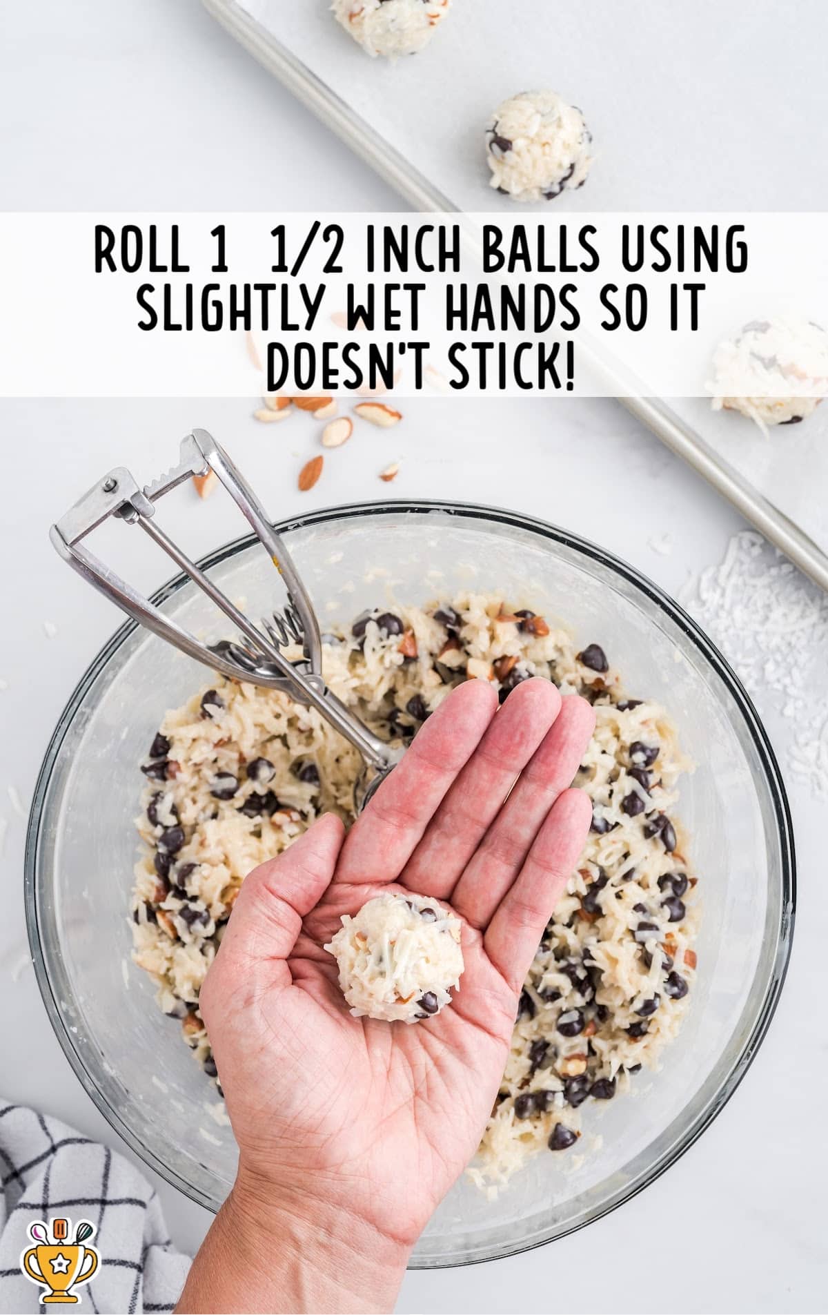 a ball for making Almond Joy Cookies rolled on a hand