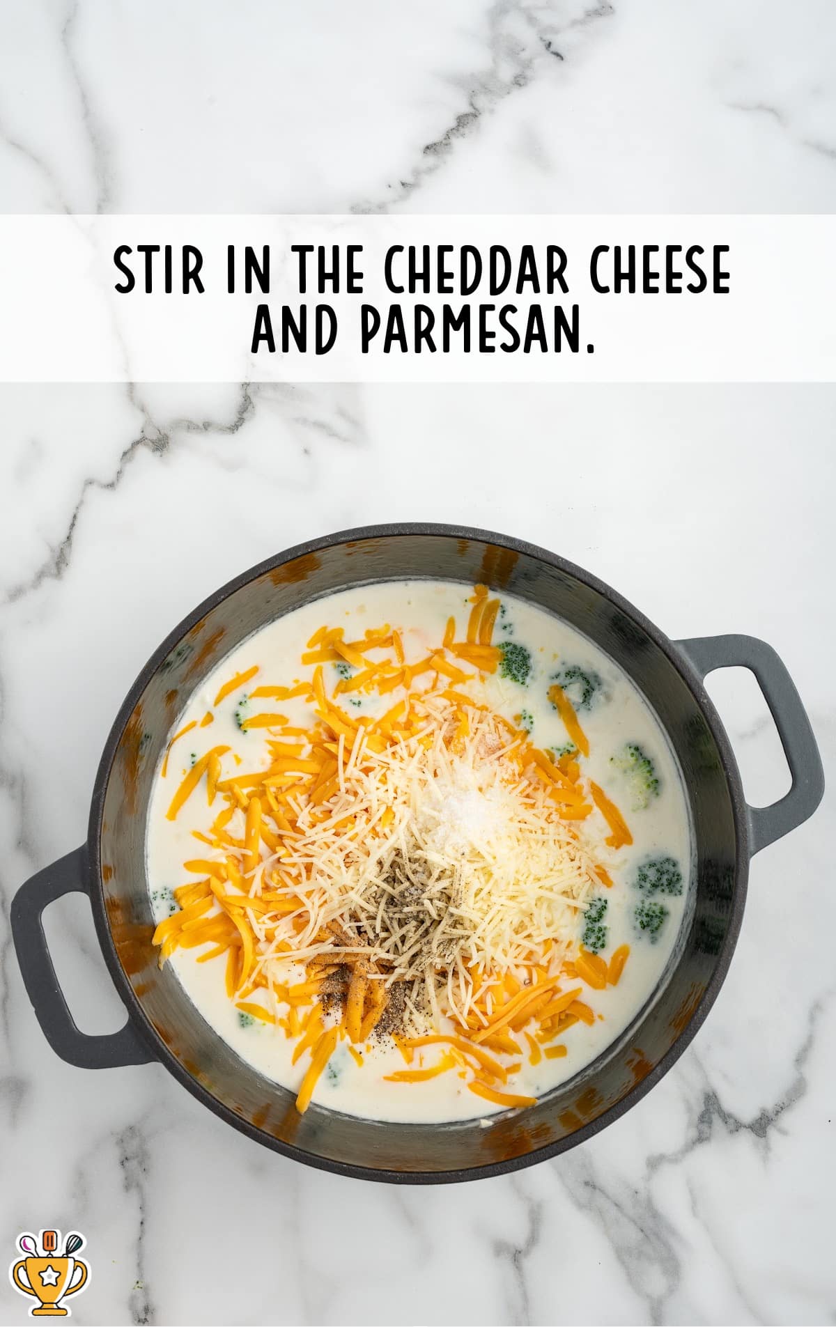 stirring in the cheddar cheese and parmesan