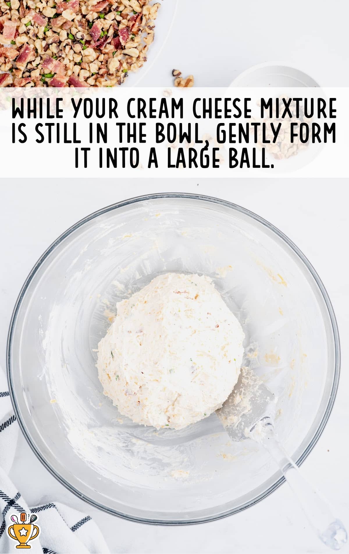 a large bowl of Cheese Ball in a clear bowl ready to cook