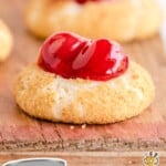a Cherry Cheesecake Cookie on a wooden board