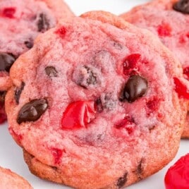a close up photo showing three Cherry Chocolate Chip Cookies
