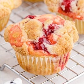 Cherry Cobbler Muffins on a cooling rack