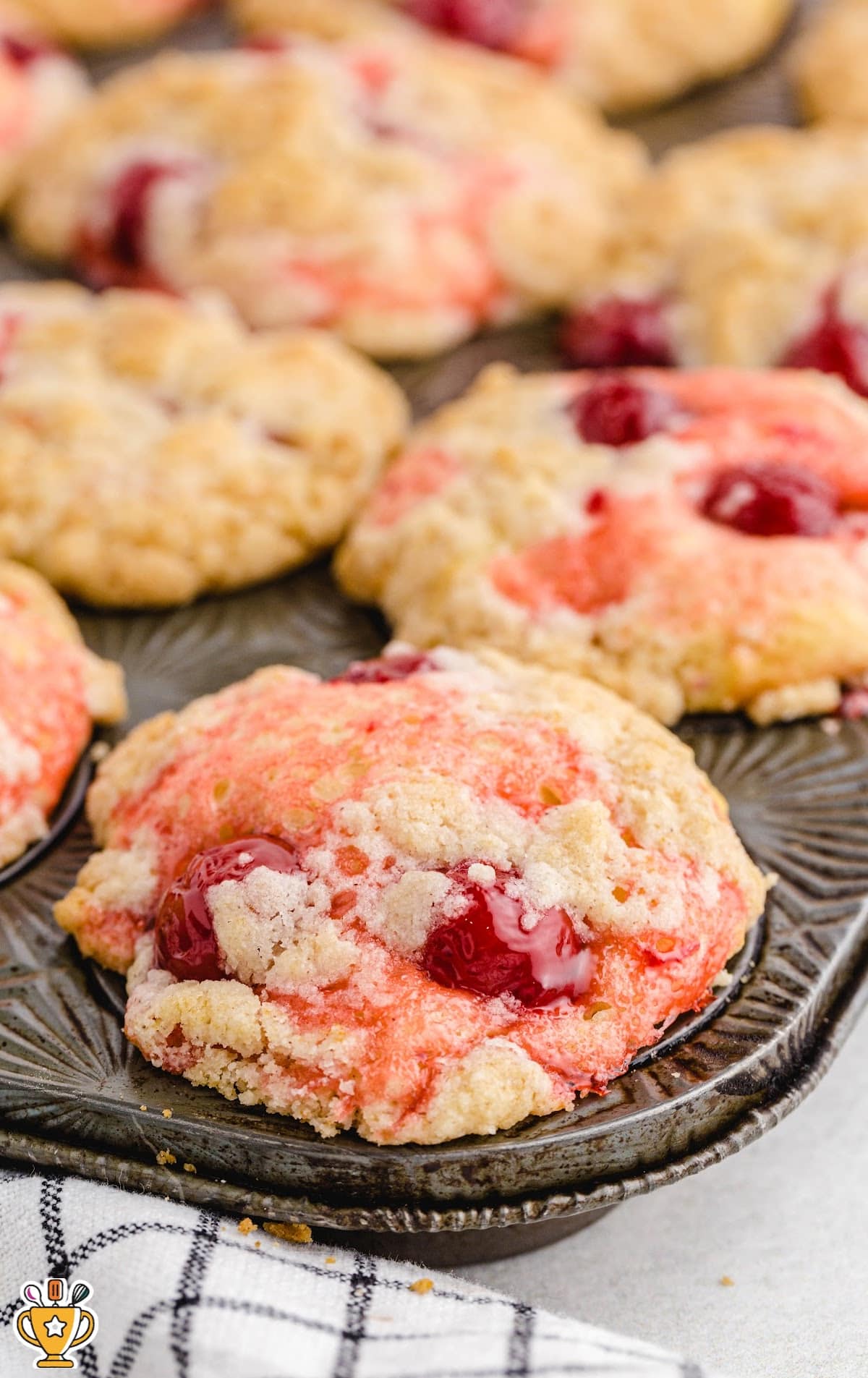Cherry Cobbler Muffins in a muffin pan