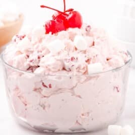 Cherry Fluff in a bowl with a cherry on top