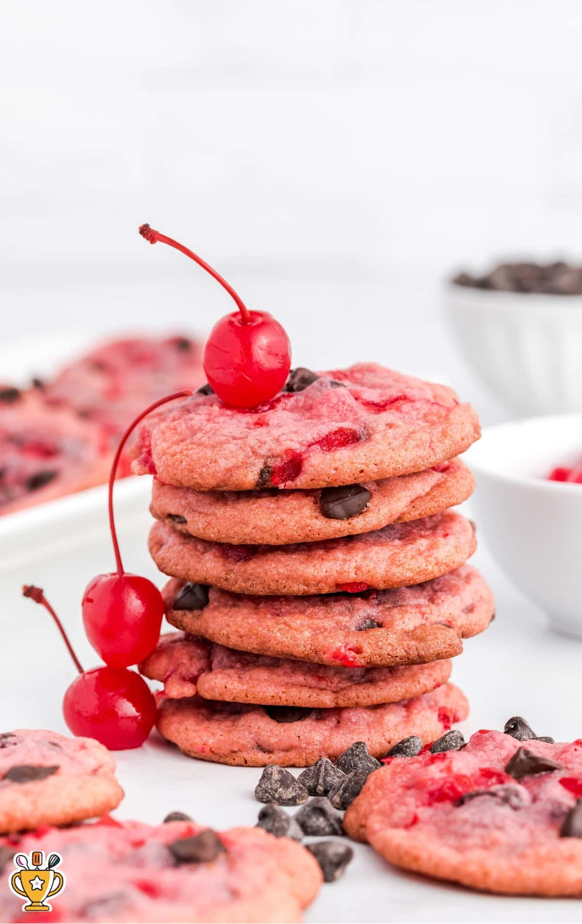 a stack of Cherry Chocolate Chip Cookies on a plate