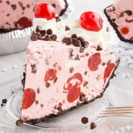 a piece of Chocolate Cherry Pie on a plate with a fork