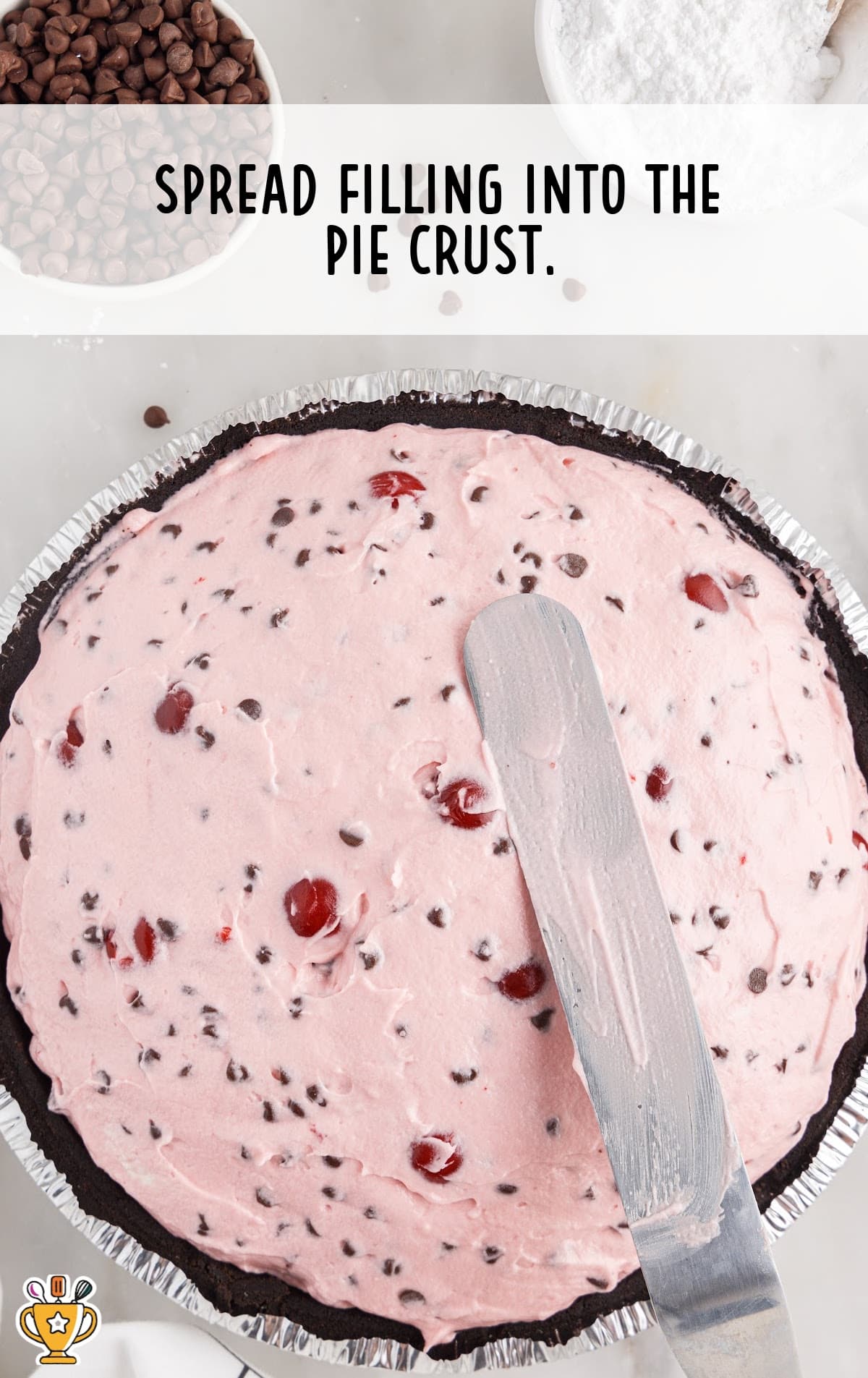 spreading the filling into the pie crust