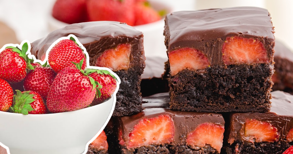 a stack of Chocolate Covered Strawberry Brownies and a bowl full of strawberries on the side