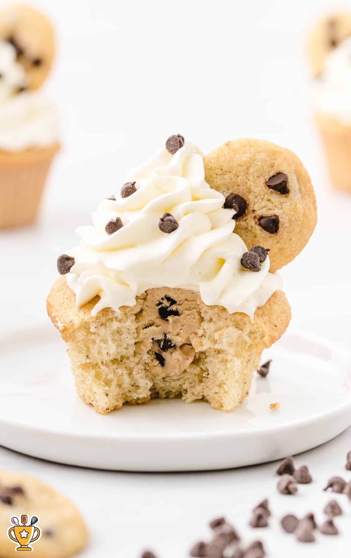 a Cookie Dough Cupcake on a white plate