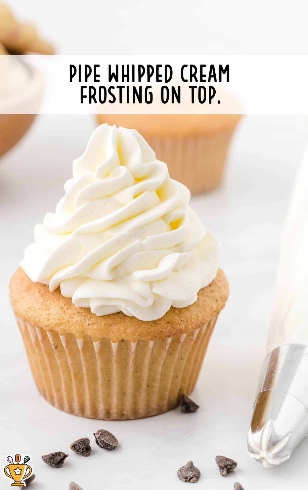 a Cookie Dough Cupcake with some frosting on top