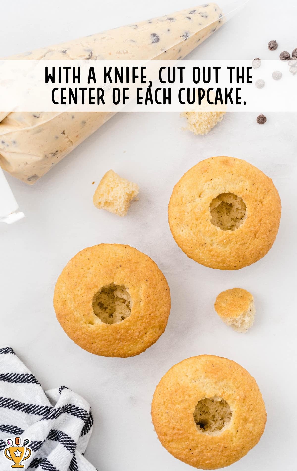 cutting out the centers of cupcakes