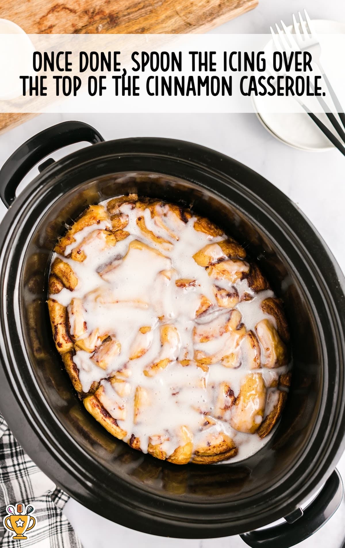 icing over the top of the cinnamon casserole