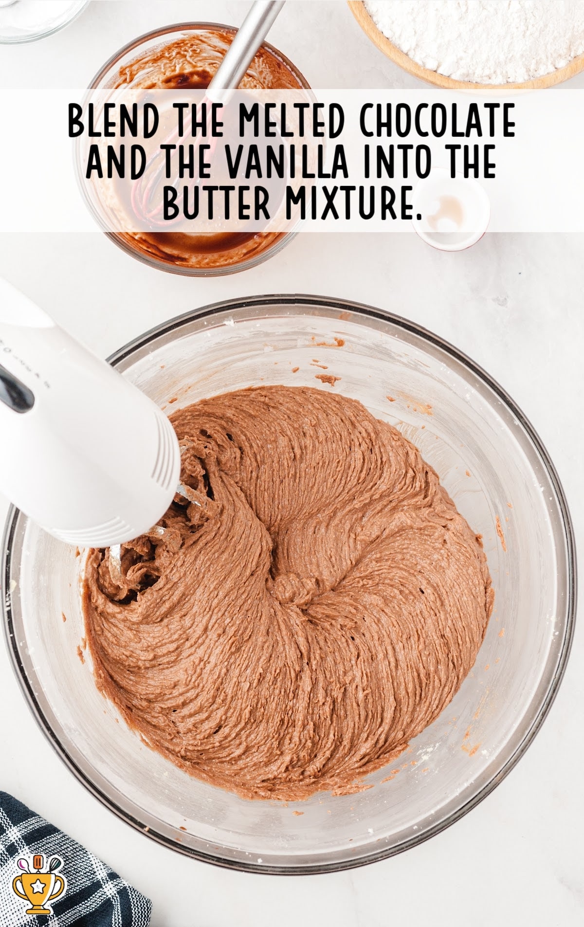 melted chocolate and vanilla blended into the butter mixture