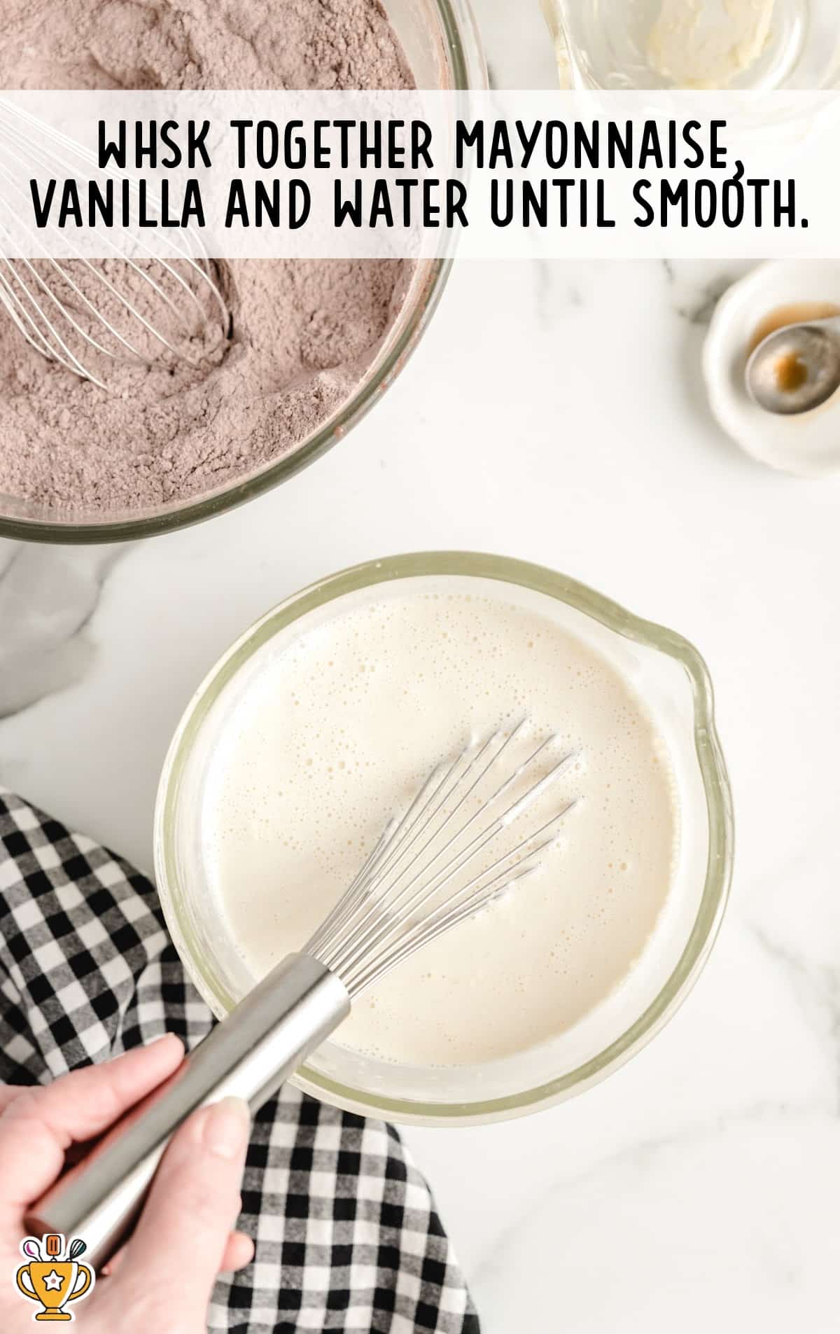 mayonnaise, vanilla and water whisked together in a bowl